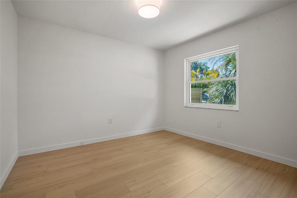 2370 Robyn Court Dunedin, FL 34698 - Photo 24 of 37 an empty room with windows