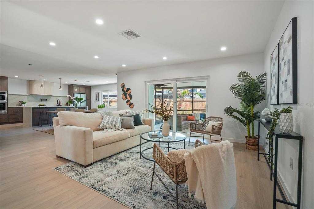 2370 Robyn Court Dunedin, FL 34698 - Photo 5 of 37 a living room with furniture and a large window