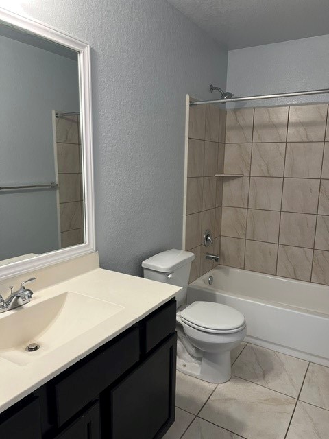 18303 Ranch View Trail Houston, TX 77073 - Photo 7 of 19 Bright and modern bathroom featuring a sleek vanity, tiled shower-tub combo, and elegant fixtures.