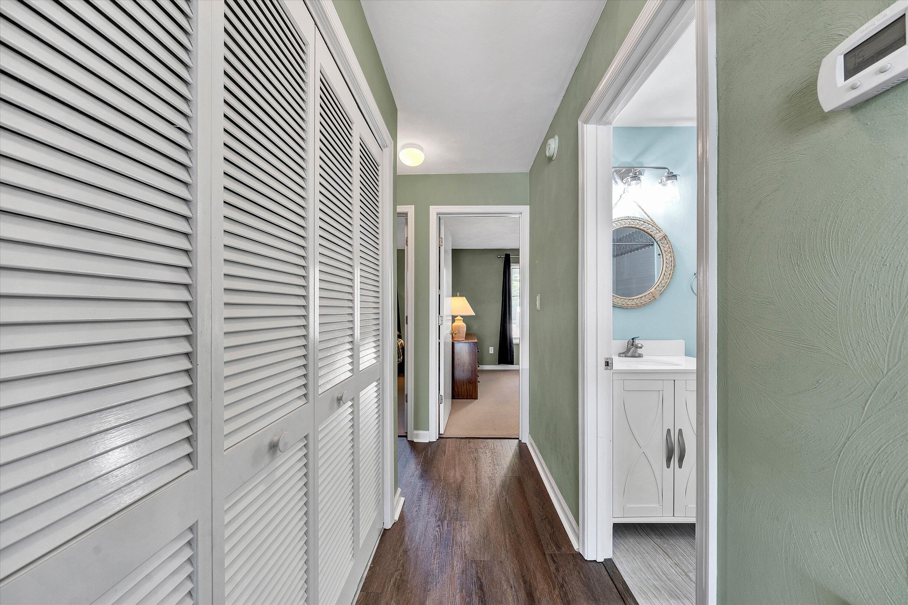 845 Gangplank Road, Unit 210 Moneta, VA 24121 - Photo 18 of 34 a view of a hallway with wooden floor