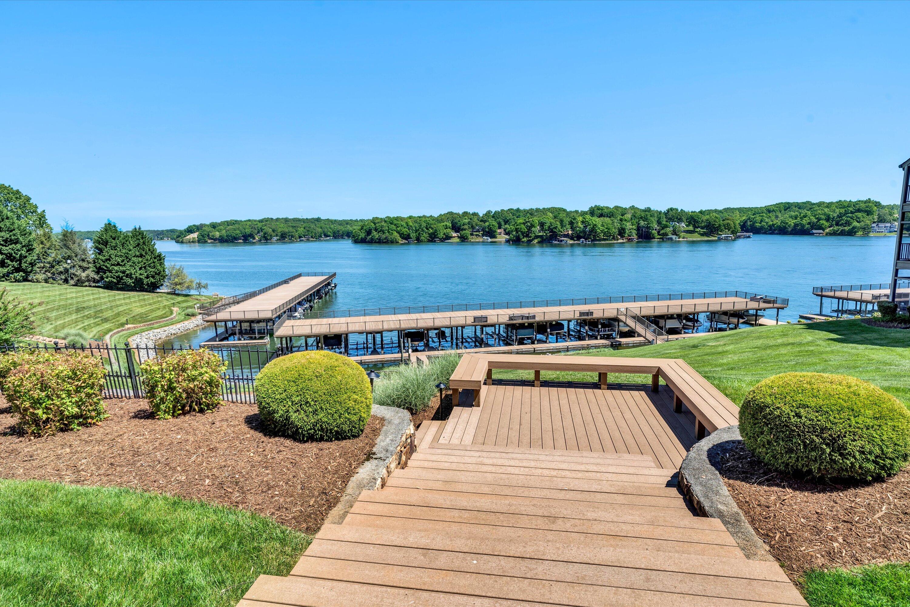 845 Gangplank Road, Unit 210 Moneta, VA 24121 - Photo 26 of 34 a view of a lake with couches and wooden floor