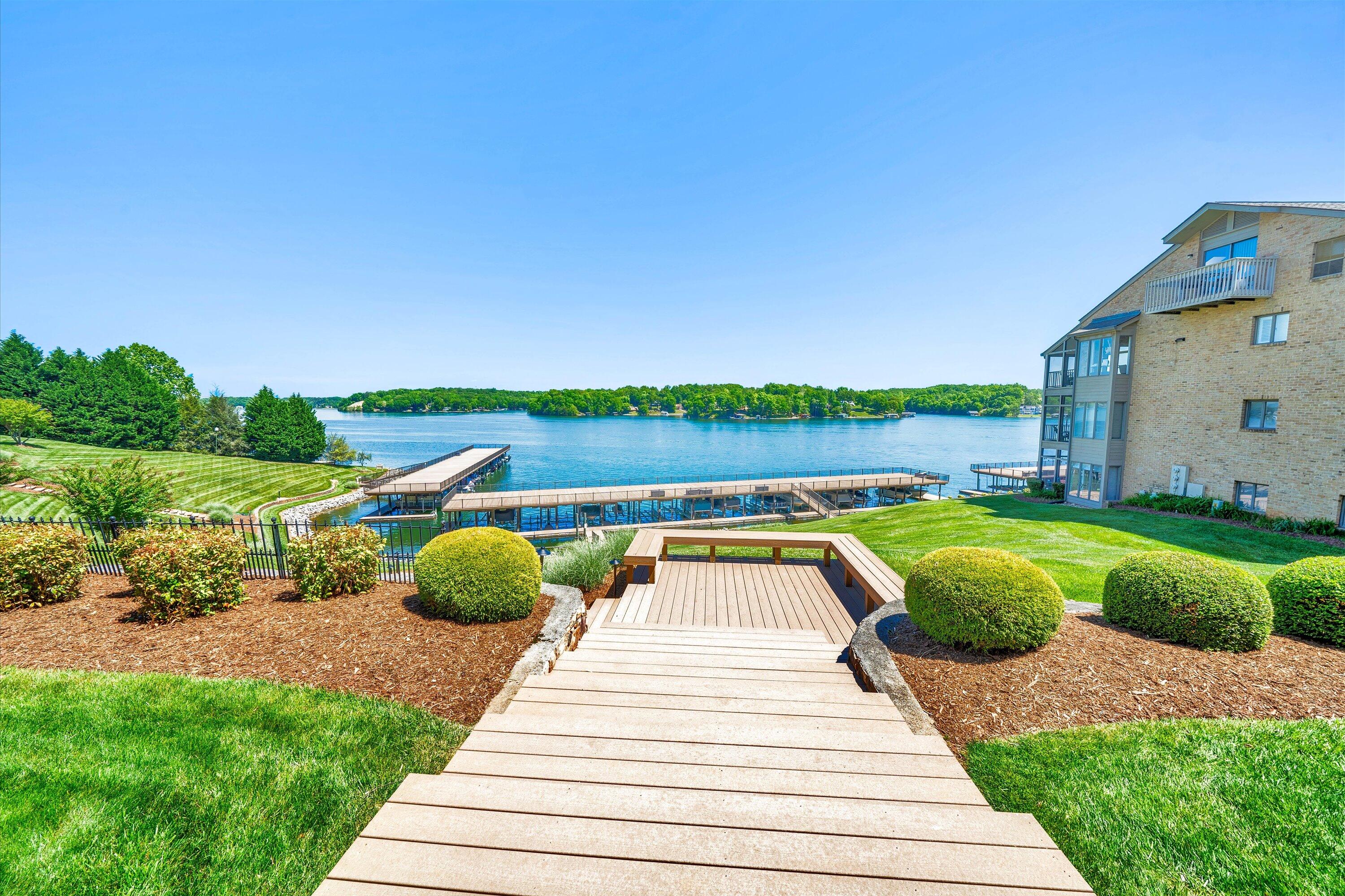 845 Gangplank Road, Unit 210 Moneta, VA 24121 - Photo 27 of 34 a view of swimming pool with a patio and a yard