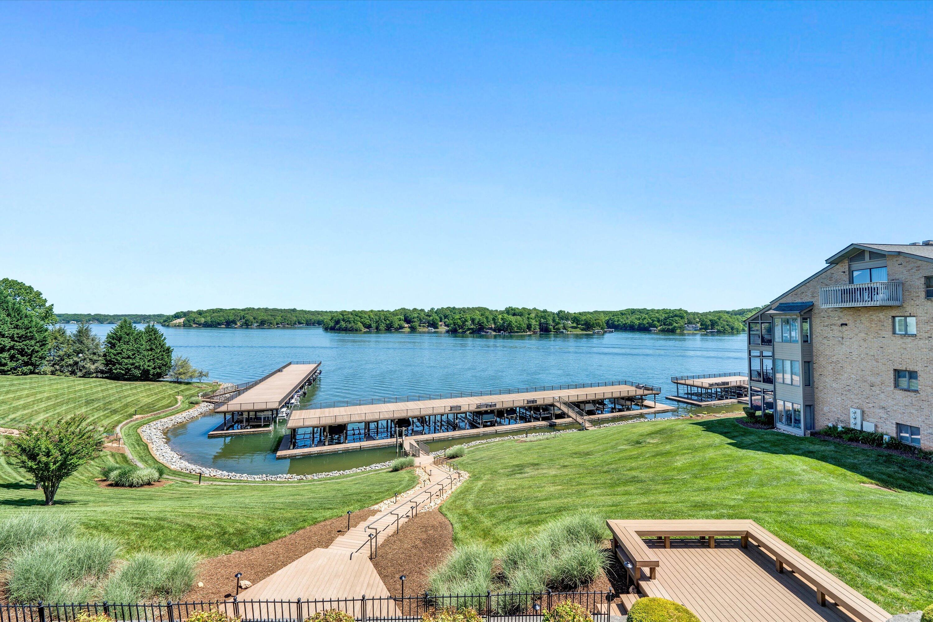 845 Gangplank Road, Unit 210 Moneta, VA 24121 - Photo 28 of 34 a view of a wooden deck and lake view