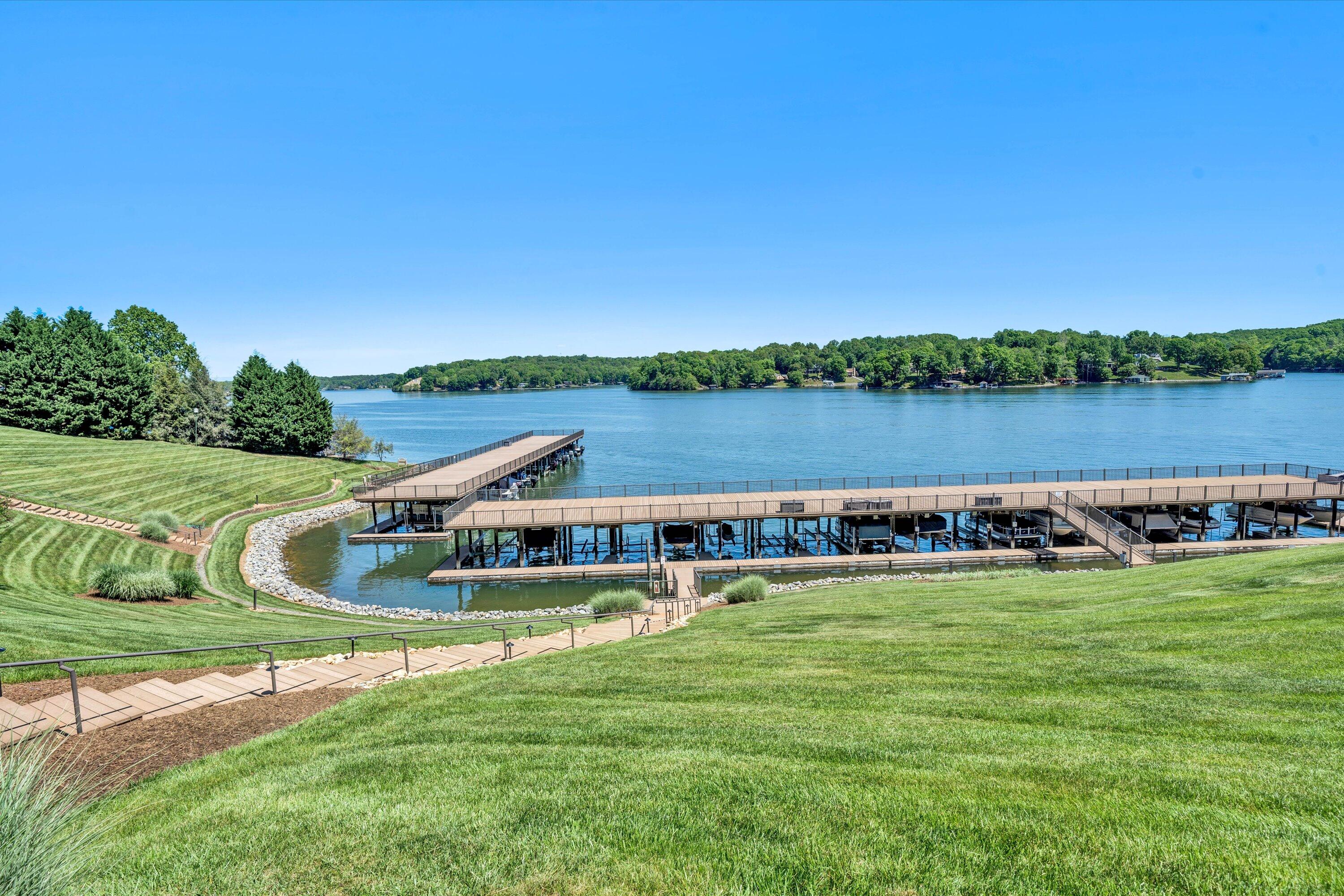 845 Gangplank Road, Unit 210 Moneta, VA 24121 - Photo 32 of 34 a view of a lake with houses in the back