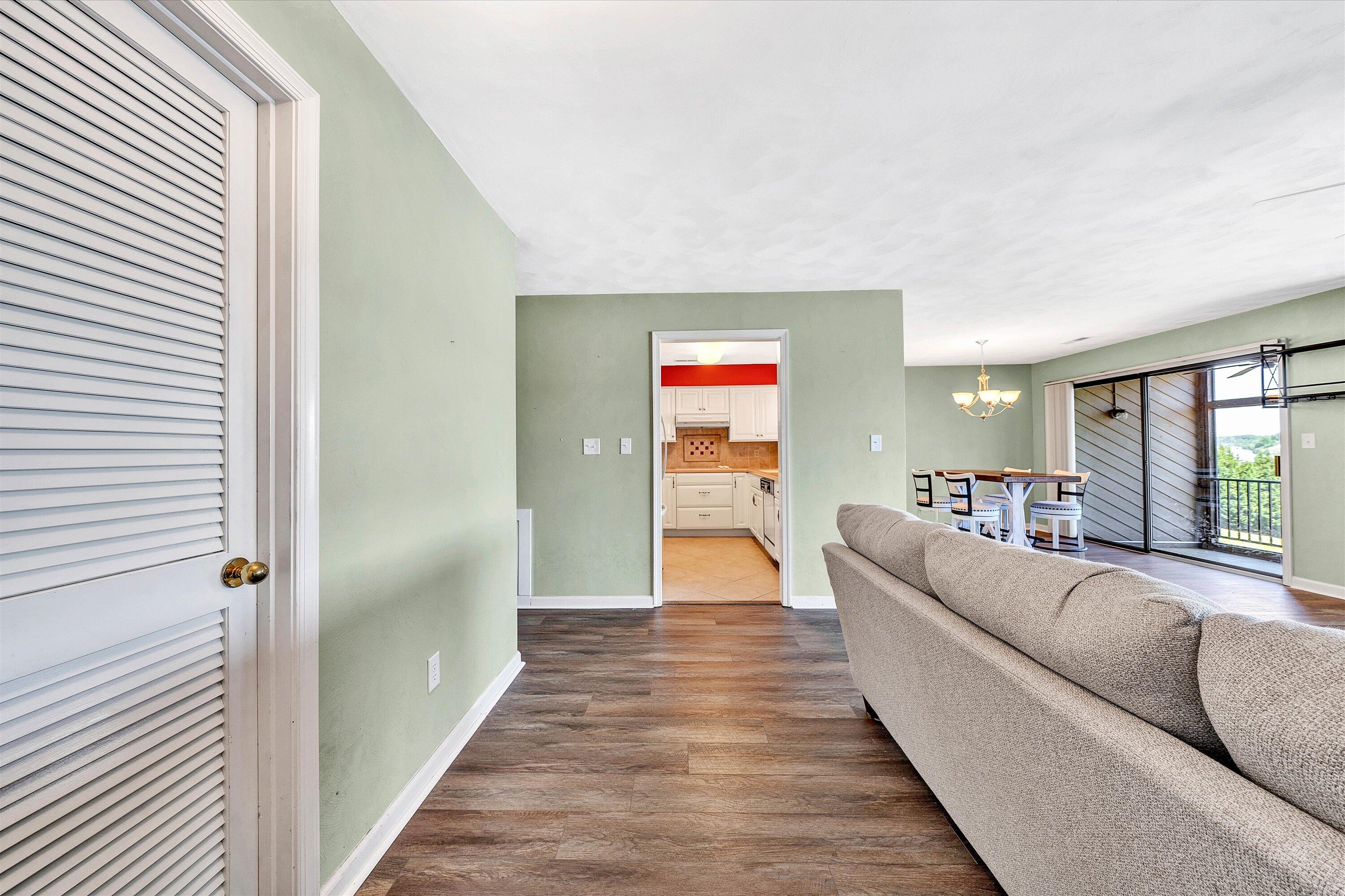 845 Gangplank Road, Unit 210 Moneta, VA 24121 - Photo 7 of 34 a living room with furniture and a large window