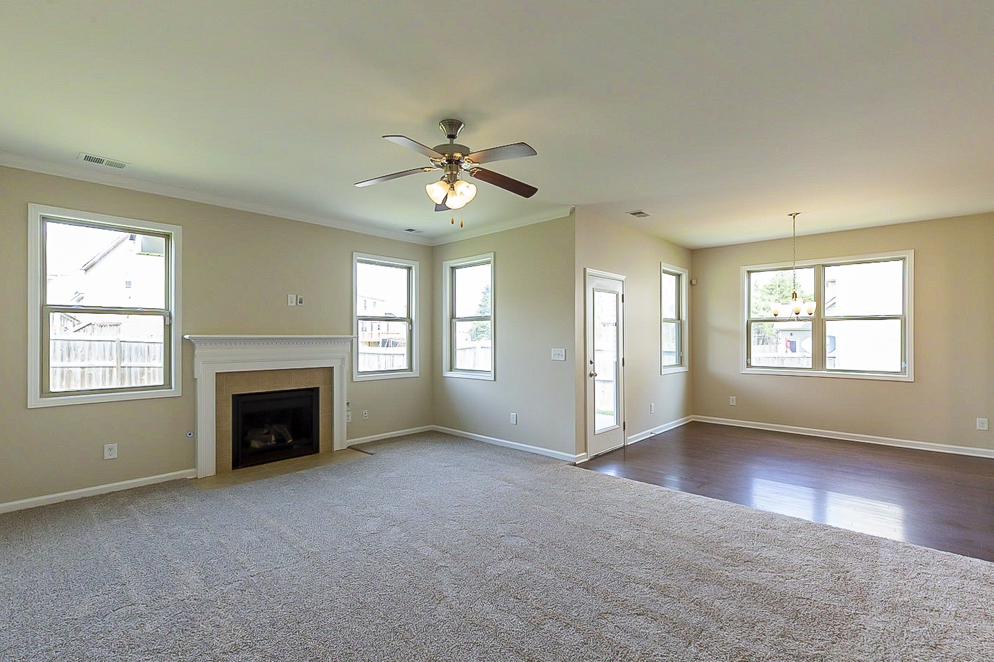 3005 Alan Drive Spring Hill, TN 37174 - Photo 11 of 31 an empty room with windows and fireplace