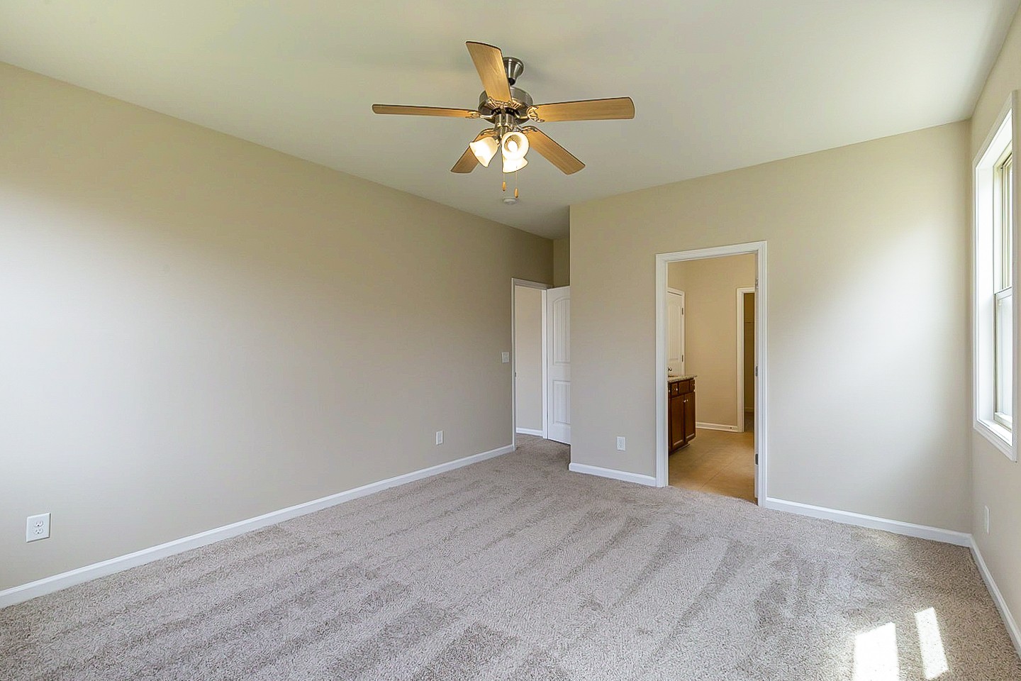 3005 Alan Drive Spring Hill, TN 37174 - Photo 16 of 31 a view of an empty room and chandelier fan
