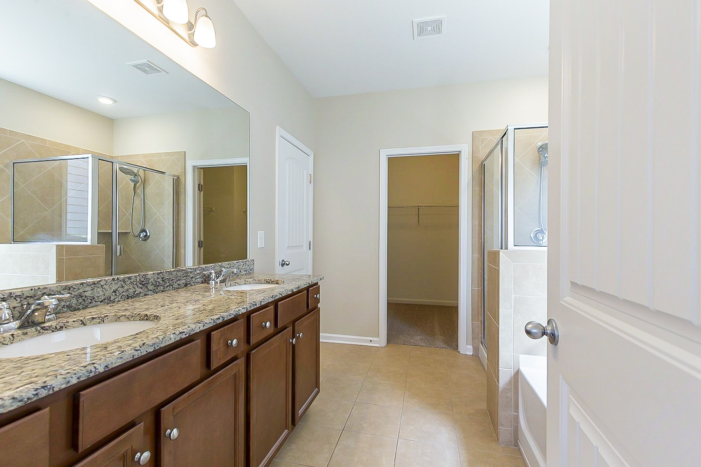 3005 Alan Drive Spring Hill, TN 37174 - Photo 17 of 31 a bathroom with a granite countertop sink and a mirror