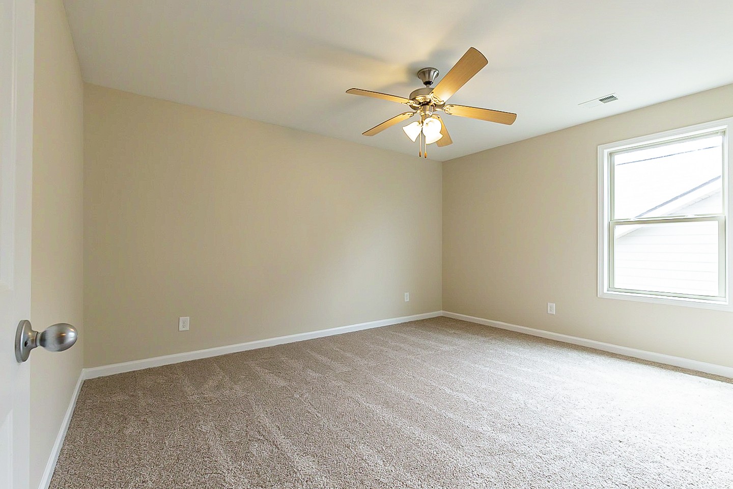 3005 Alan Drive Spring Hill, TN 37174 - Photo 24 of 31 an empty room with a window and a fan