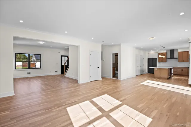 a view of a kitchen with a sink and cabinets