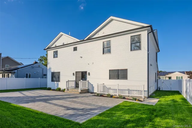 a view of a backyard of the house