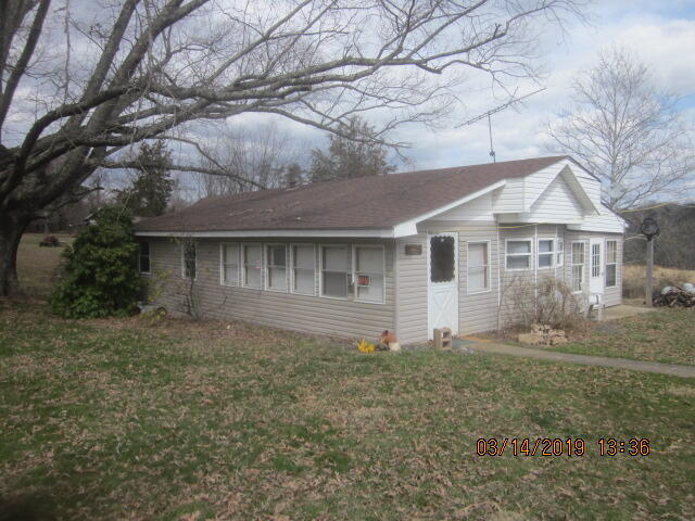 1510 Morgans Fork Road Penhook, VA 24137 - Photo 1 of 2 a front view of a house with yard