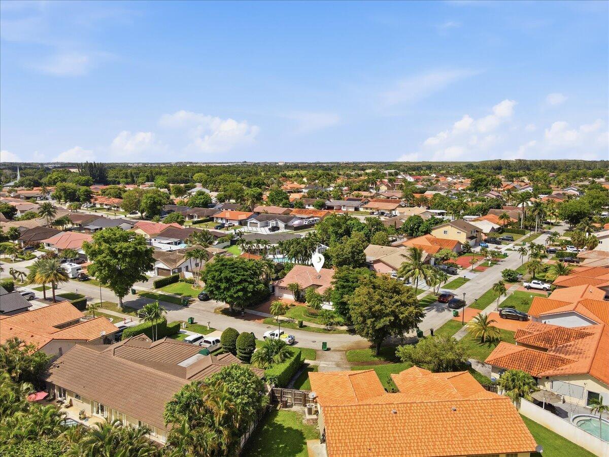 20009 Northwest 66th Place Hialeah, FL 33015 - Photo 31 of 33 an aerial view of residential building and street