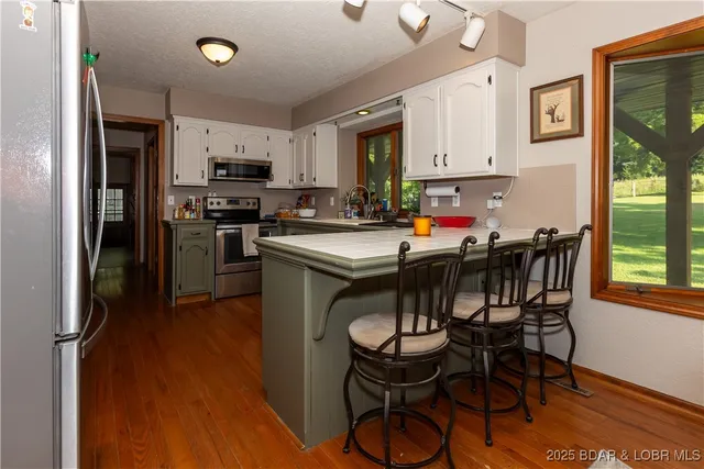 $470,000 | 776 Big Buffalo Road, Stover, MO 65078