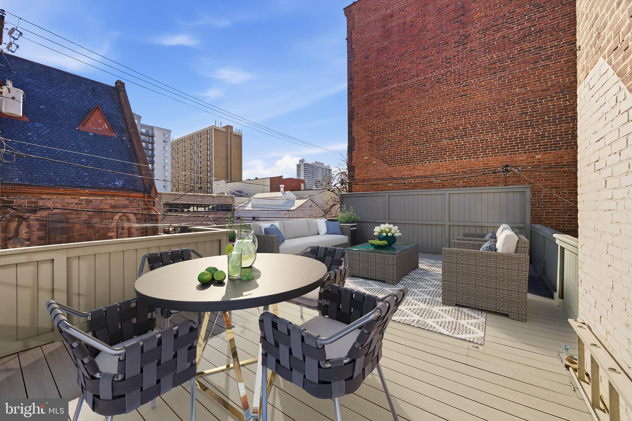 552 North 18th Street Philadelphia, PA 19130 - Photo 22 of 51 a view of a table and chairs in the balcony