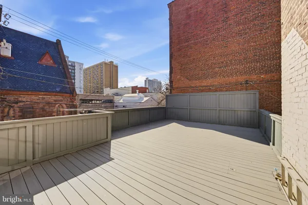 a view of a house with pool on roof deck