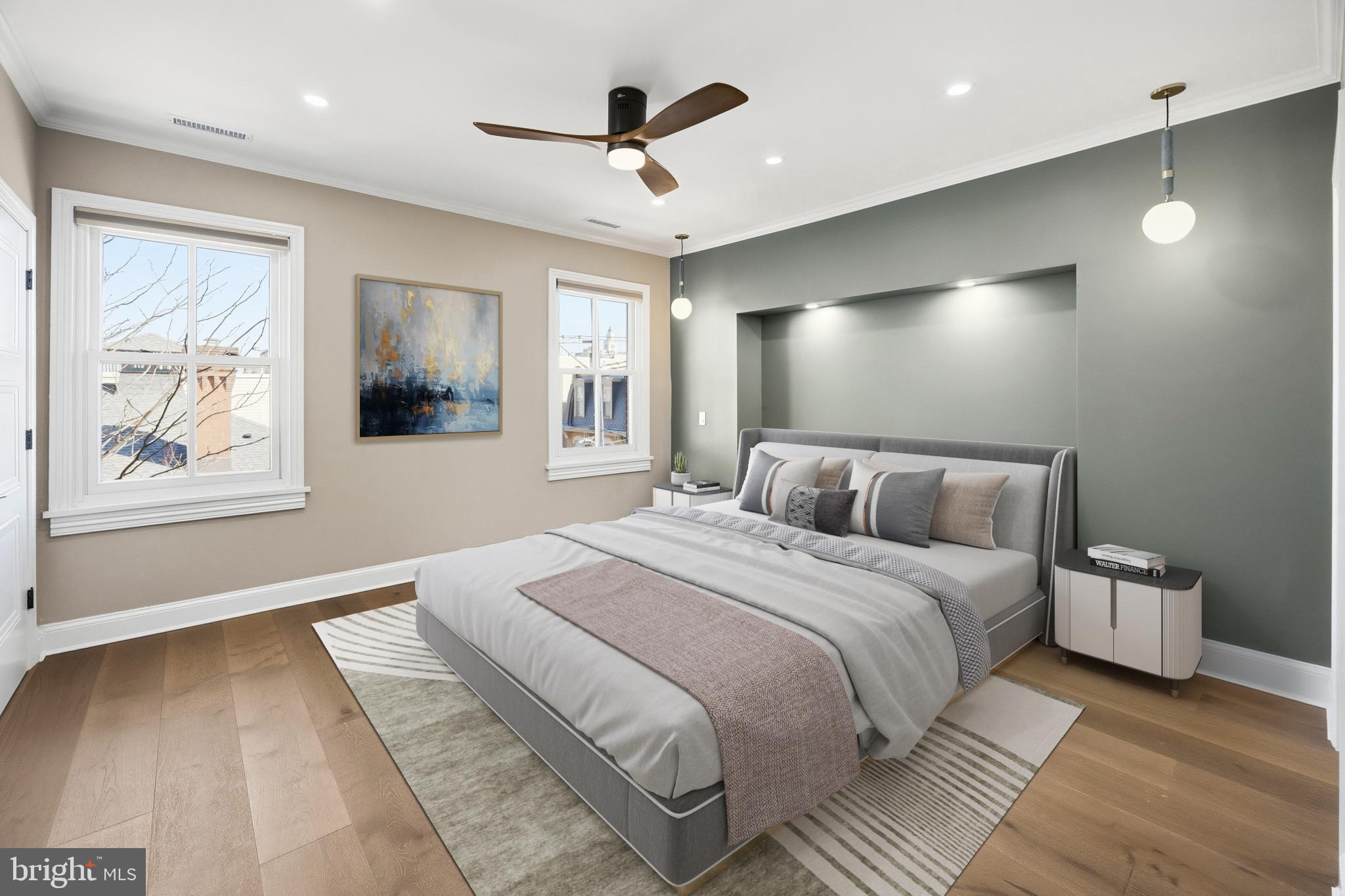 552 North 18th Street Philadelphia, PA 19130 - Photo 26 of 51 a spacious bedroom with a large bed and a chandelier