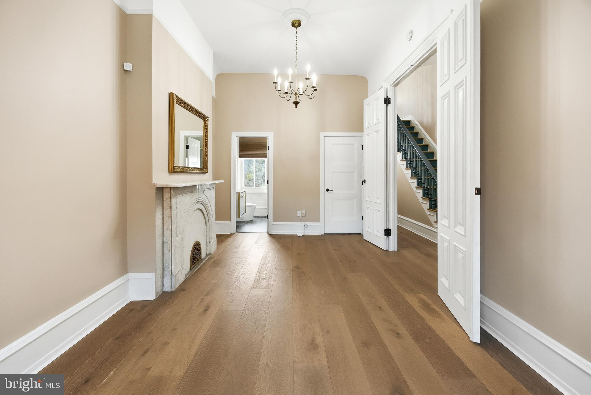 552 North 18th Street Philadelphia, PA 19130 - Photo 39 of 51 a view of a hallway with wooden floor and staircase
