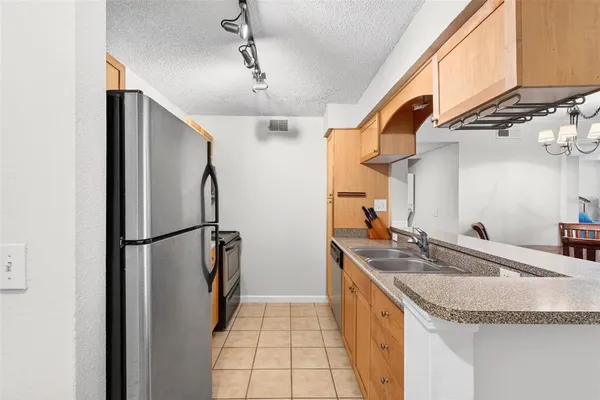 $174,999 | 2500 Winding Creek Boulevard, Unit E203, Clearwater, FL 33761