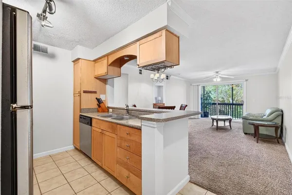 $174,999 | 2500 Winding Creek Boulevard, Unit E203, Clearwater, FL 33761