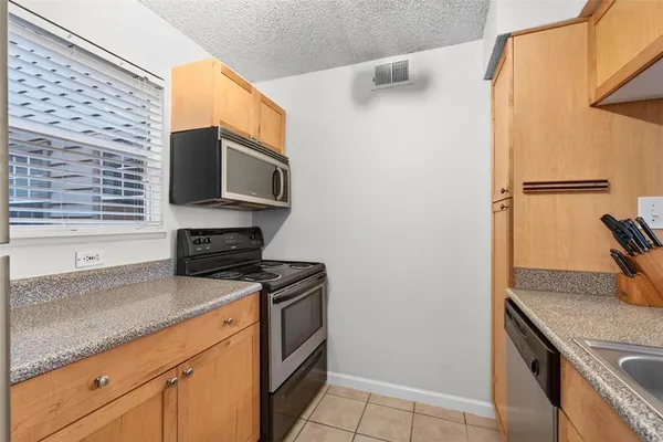 $174,999 | 2500 Winding Creek Boulevard, Unit E203, Clearwater, FL 33761