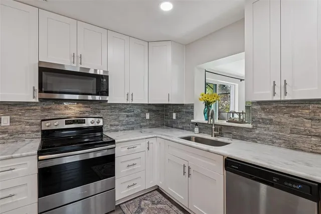 $615,000 | 1450 San Roy Drive, Dunedin, FL 34698