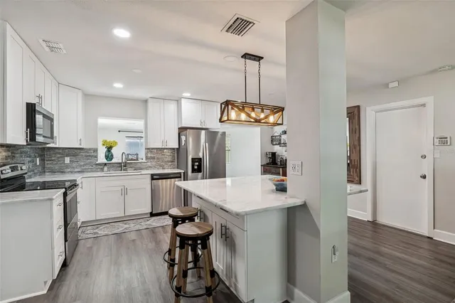 $615,000 | 1450 San Roy Drive, Dunedin, FL 34698