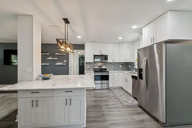 $615,000 | 1450 San Roy Drive, Dunedin, FL 34698