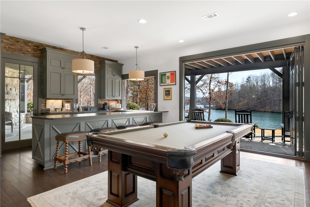 231 Quay Court Sunset, SC 29685 - Photo 27 of 48 Large Entertaining area on Lower Level, walk out deck and Lake Keowee