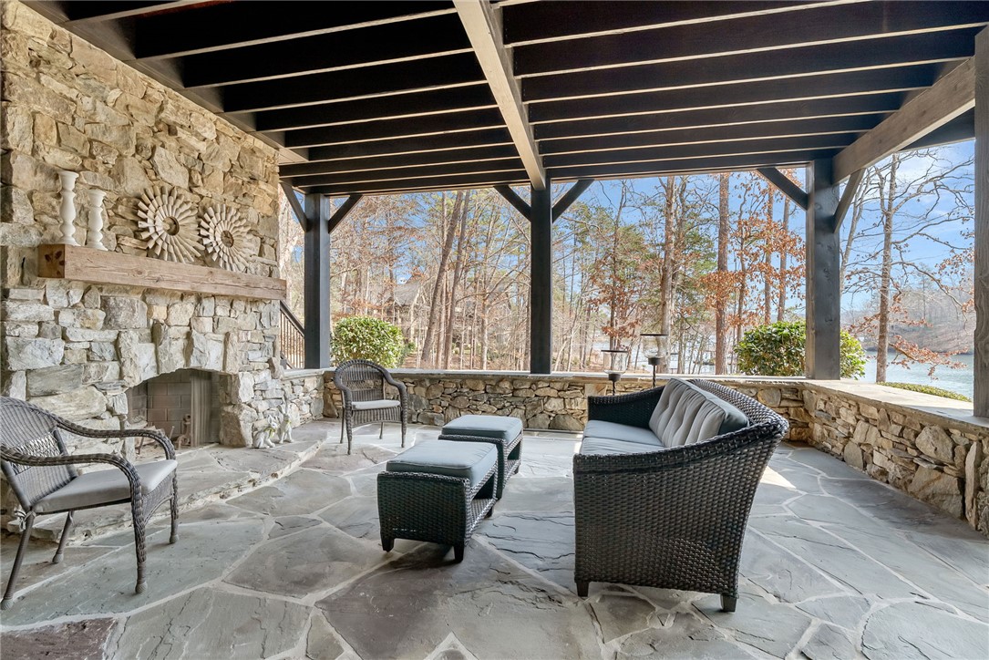 231 Quay Court Sunset, SC 29685 - Photo 31 of 48 Third Fireplace with Lake Views and large entertaining space off of Lower Level bar