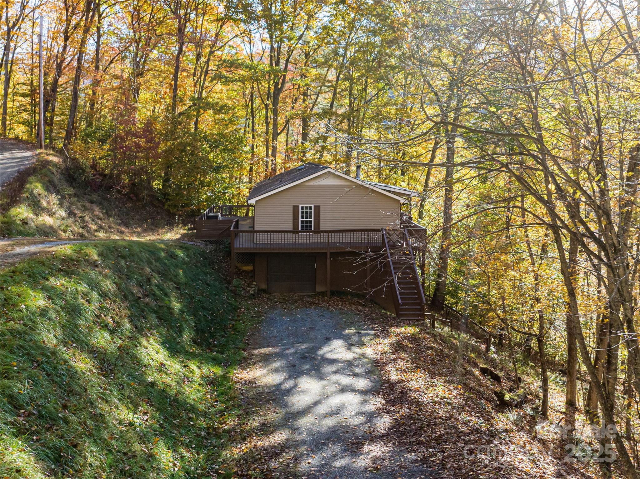 334 Foxden Road Mars Hill, NC 28754 - Photo 29 of 43 a small house with a trees in front of it