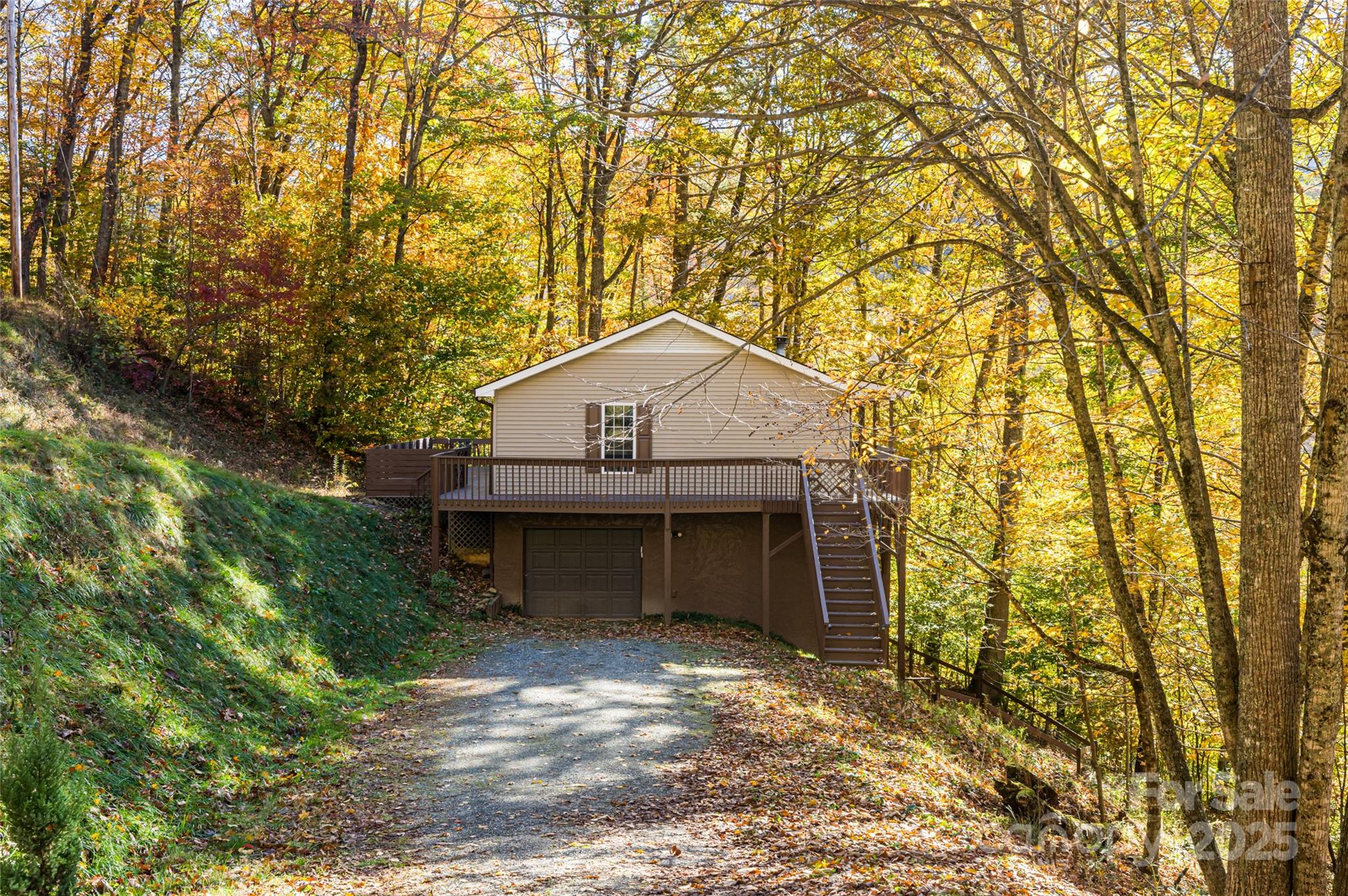 334 Foxden Road Mars Hill, NC 28754 - Photo 30 of 43 a view of house with a yard and large tree