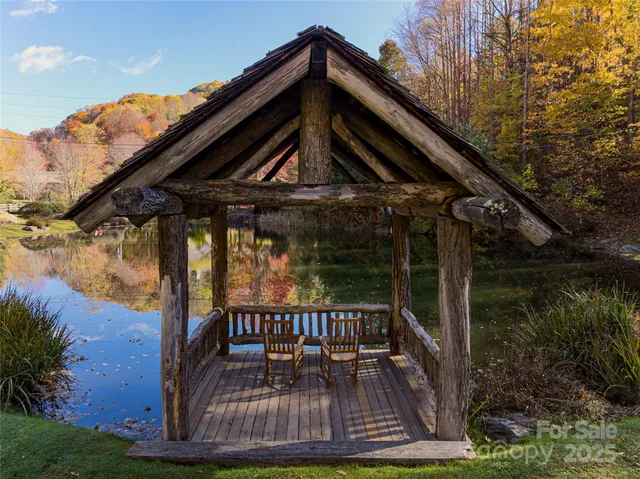 a view of a chair and table in the patio