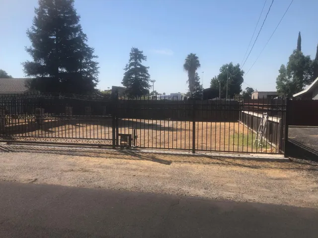 a view of a tennis court with a street view