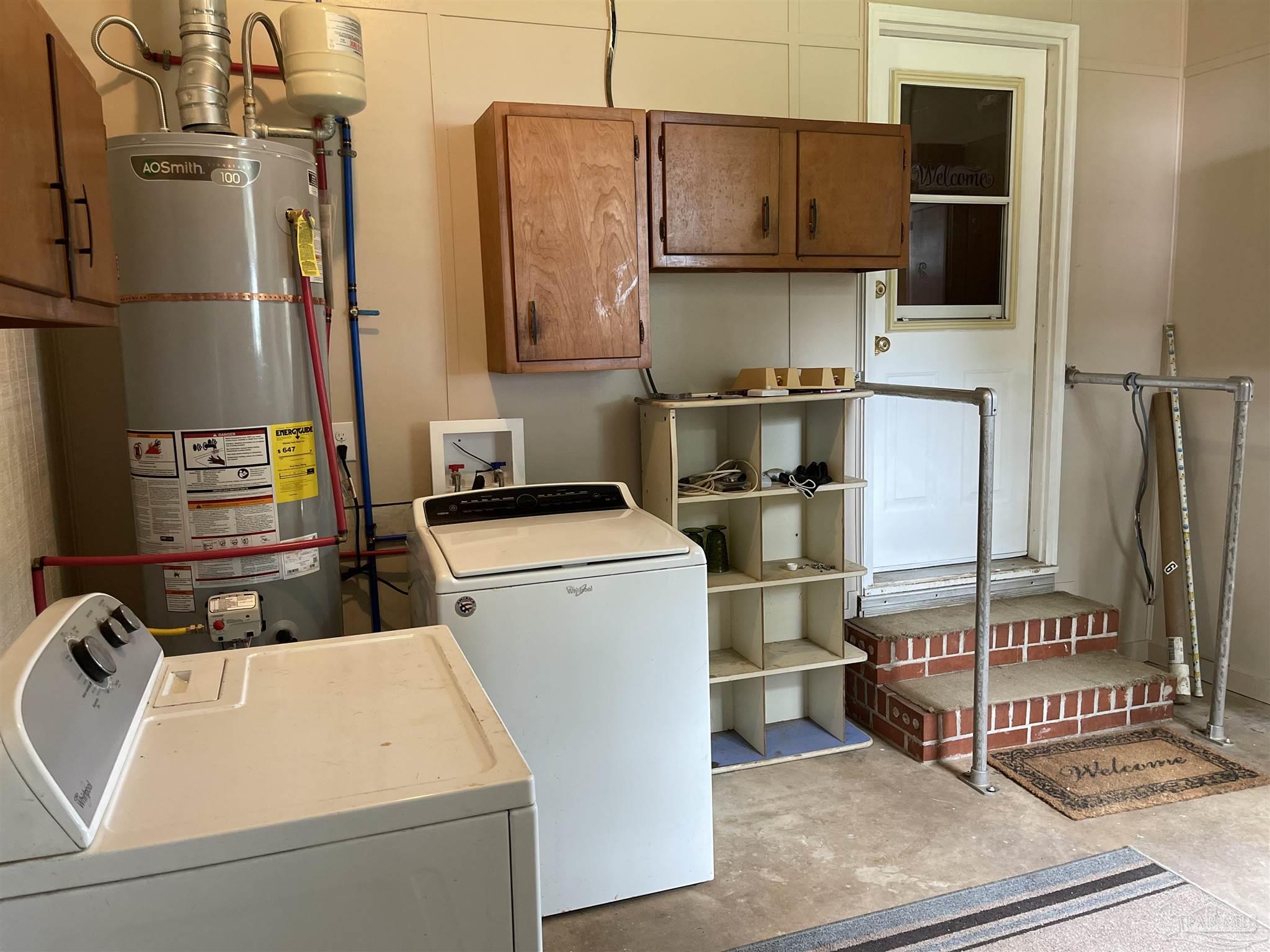 9550 Highway 89 Milton, FL 32570 - Photo 15 of 18 a utility room with dryer and washer