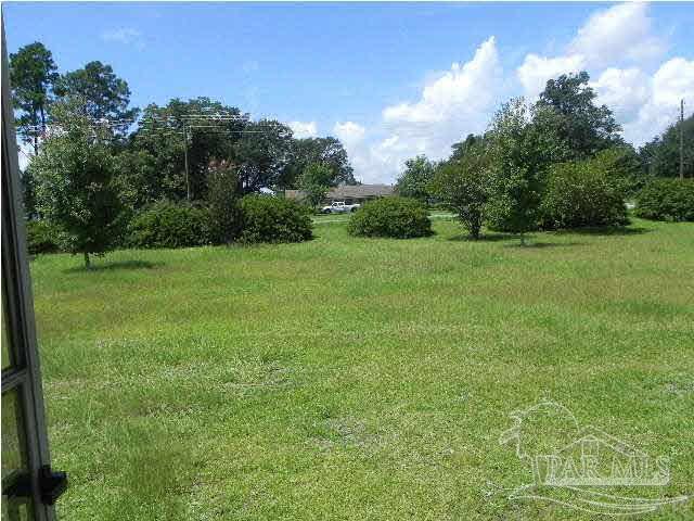 9550 Highway 89 Milton, FL 32570 - Photo 18 of 18 a view of field with trees in the background