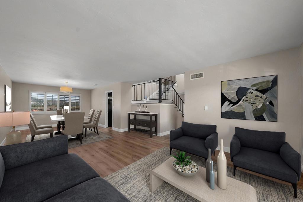 4363 Country Trails Lane Bonita, CA 91902 - Photo 11 of 27 a living room with furniture and a fireplace