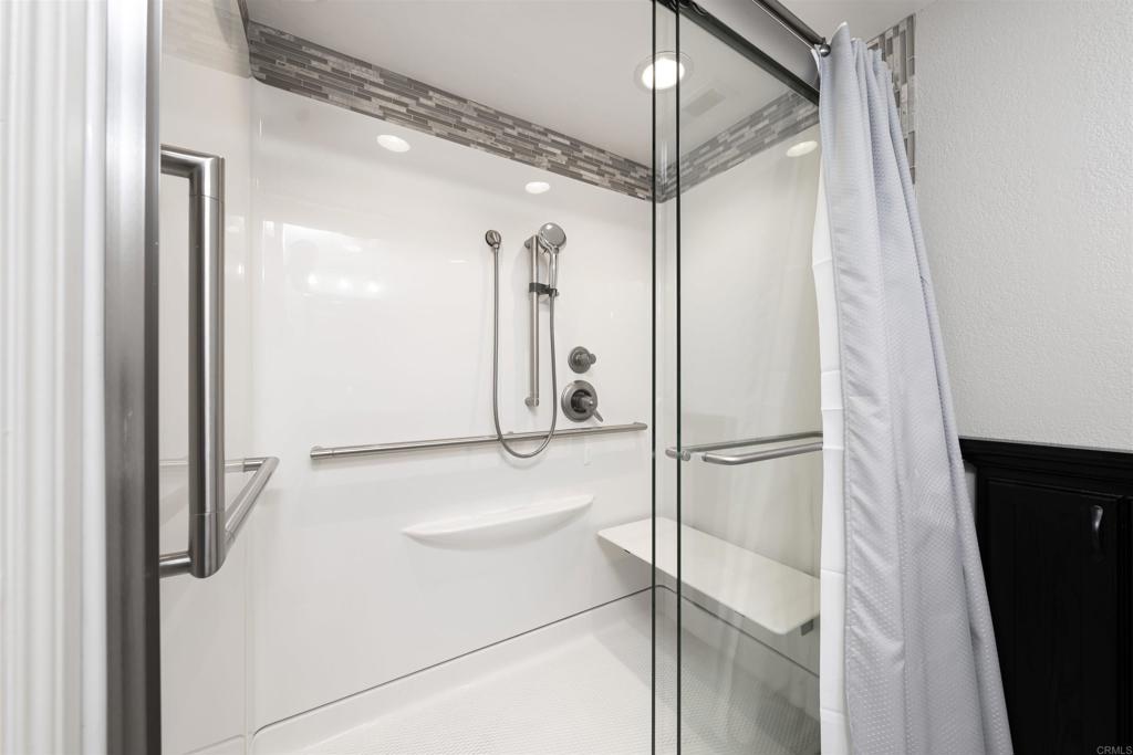 4363 Country Trails Lane Bonita, CA 91902 - Photo 13 of 27 a bathroom with a shower and a glass door
