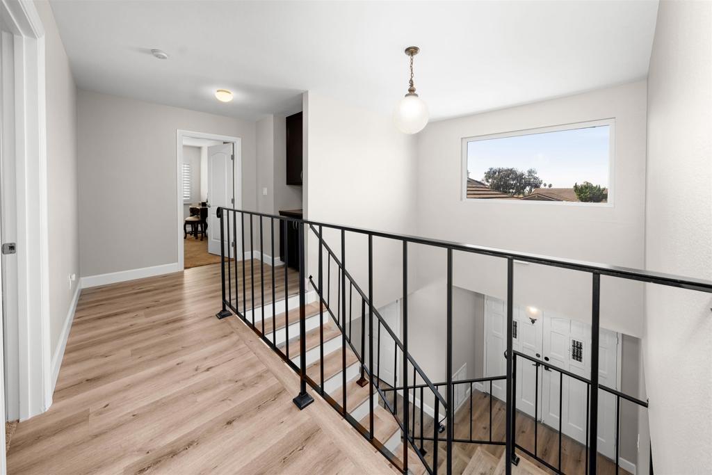 4363 Country Trails Lane Bonita, CA 91902 - Photo 14 of 27 a view of hallway with wooden floor