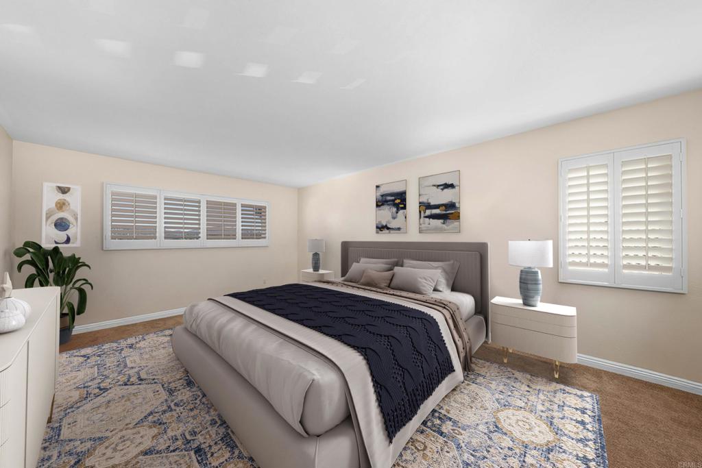 4363 Country Trails Lane Bonita, CA 91902 - Photo 15 of 27 a bedroom with a large bed and a window