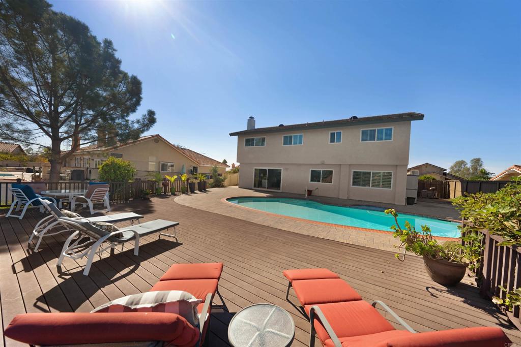 4363 Country Trails Lane Bonita, CA 91902 - Photo 21 of 27 a front view of a house with garden