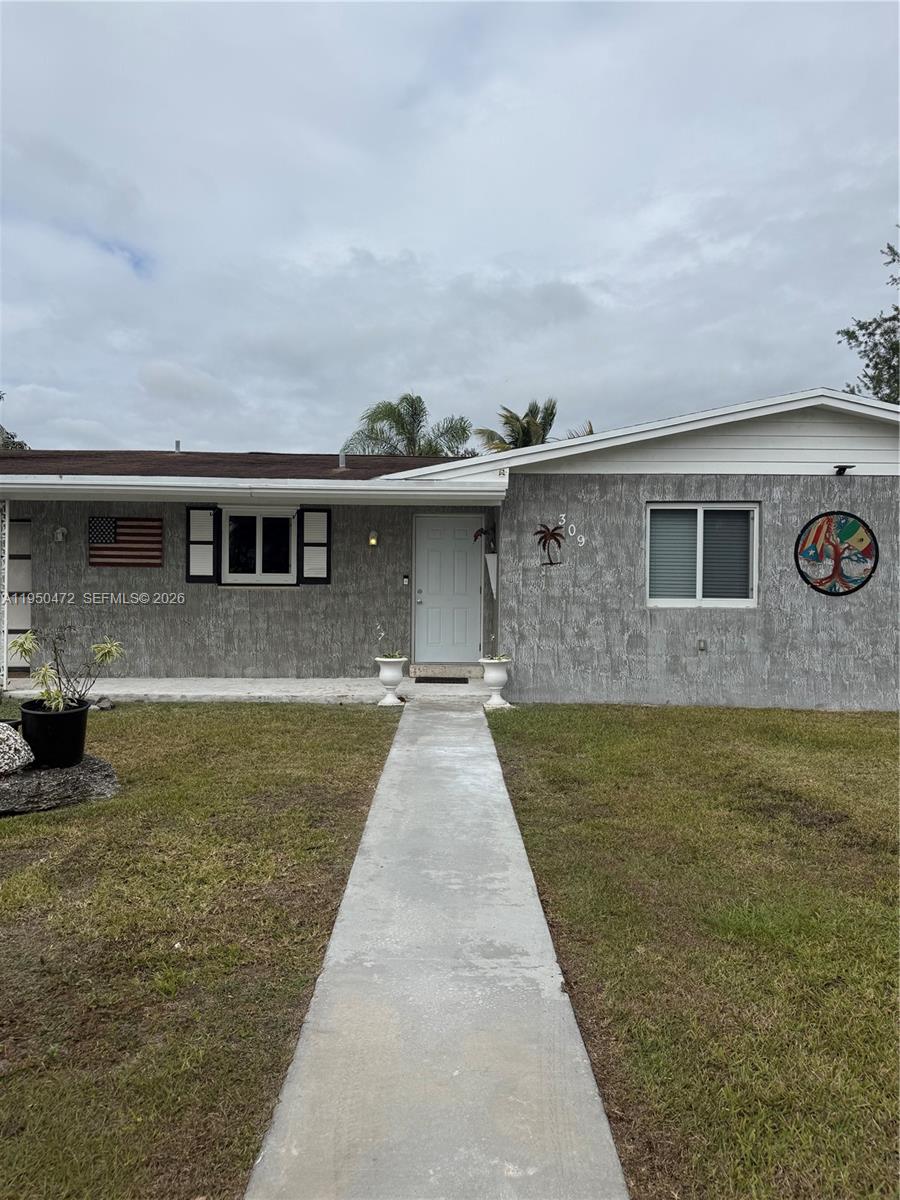 a front view of house with yard