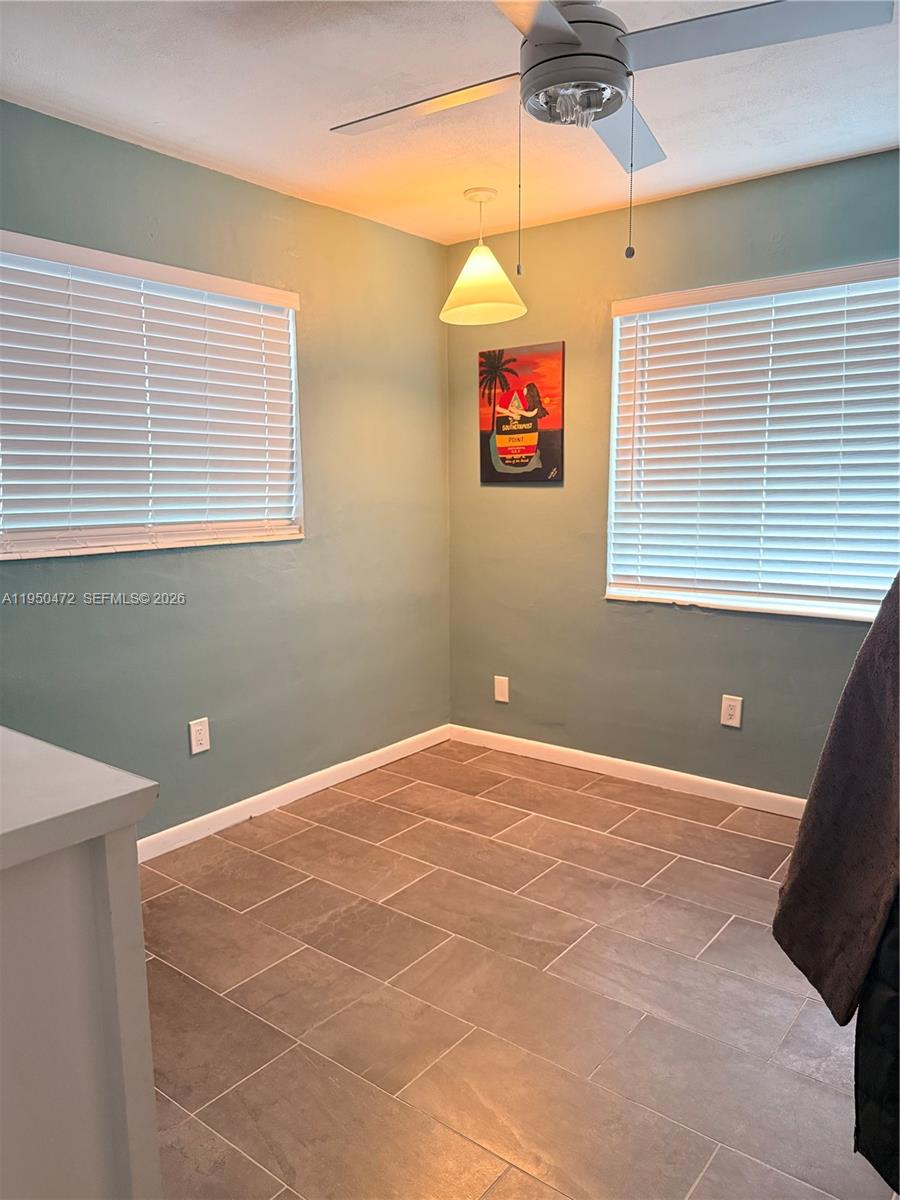 309 Northwest 15th Street Homestead, FL 33030 - Photo 14 of 19 a view of an empty room with a window
