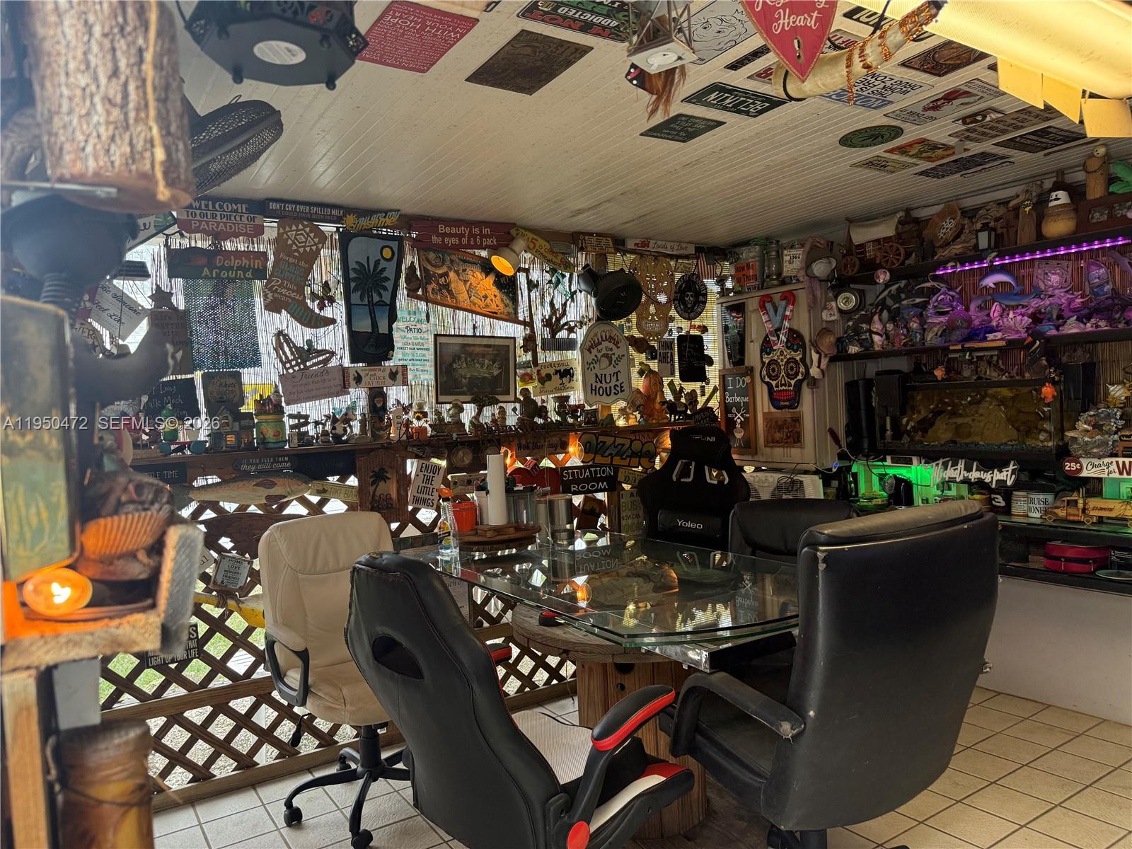 309 Northwest 15th Street Homestead, FL 33030 - Photo 18 of 19 a view of a chairs and tables in a patio