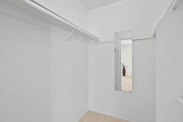 a bathroom with a shower and a shower