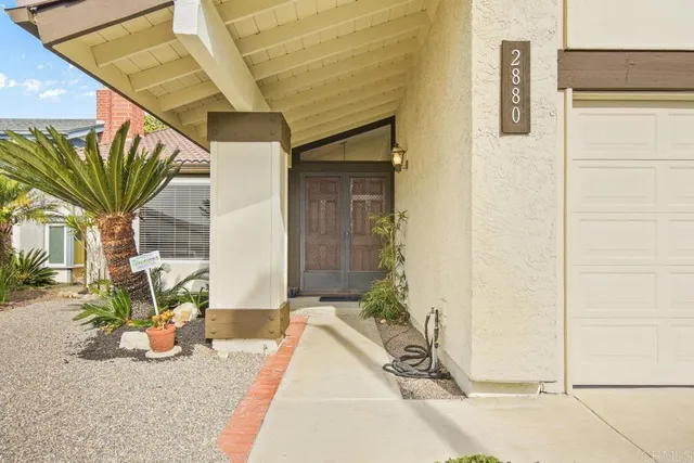 a view of entryway with a wooden door