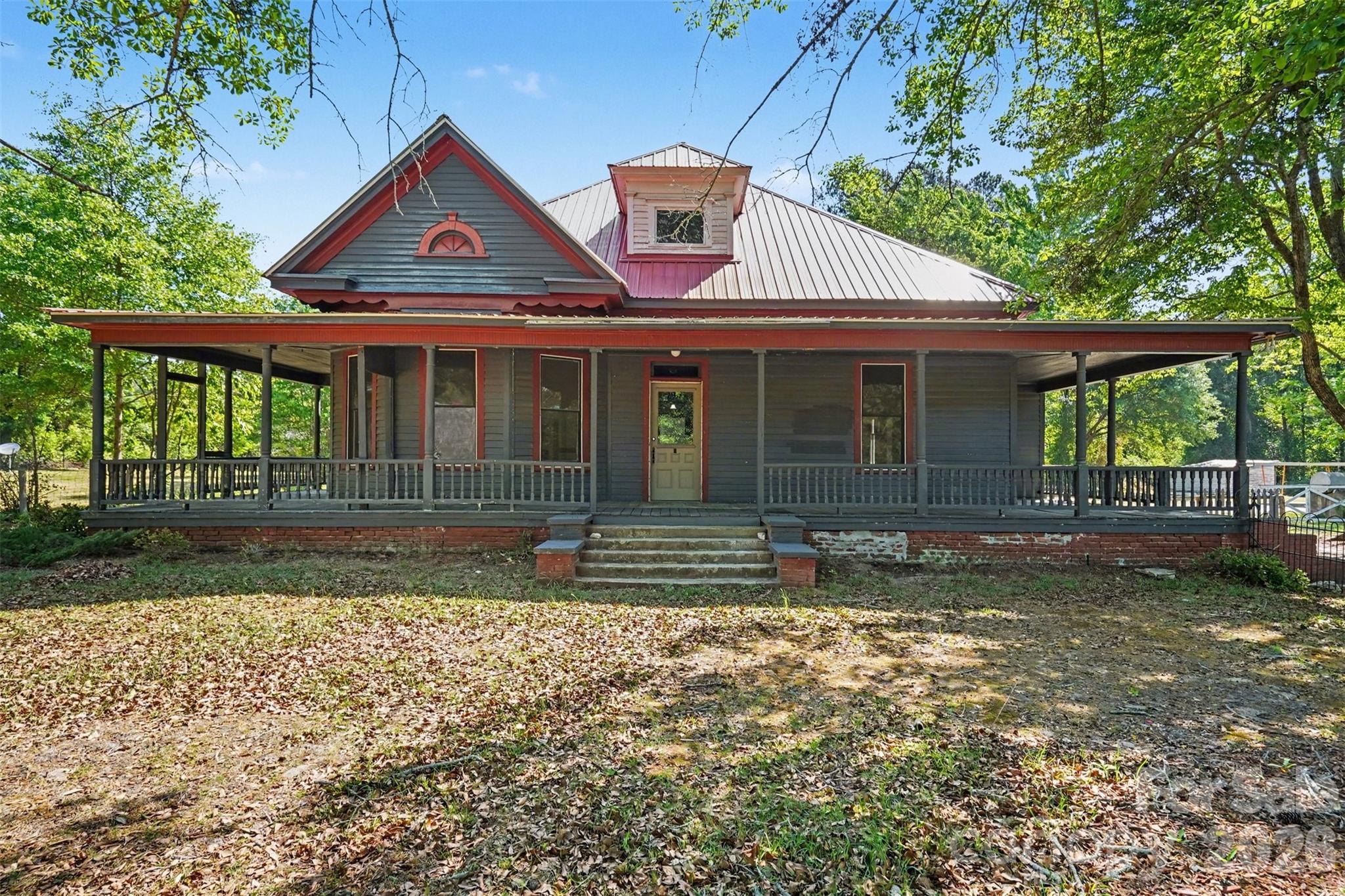 215 Theodore R Carr Avenue Morven, NC 28119 - Photo 2 of 28 a front view of a house with garden