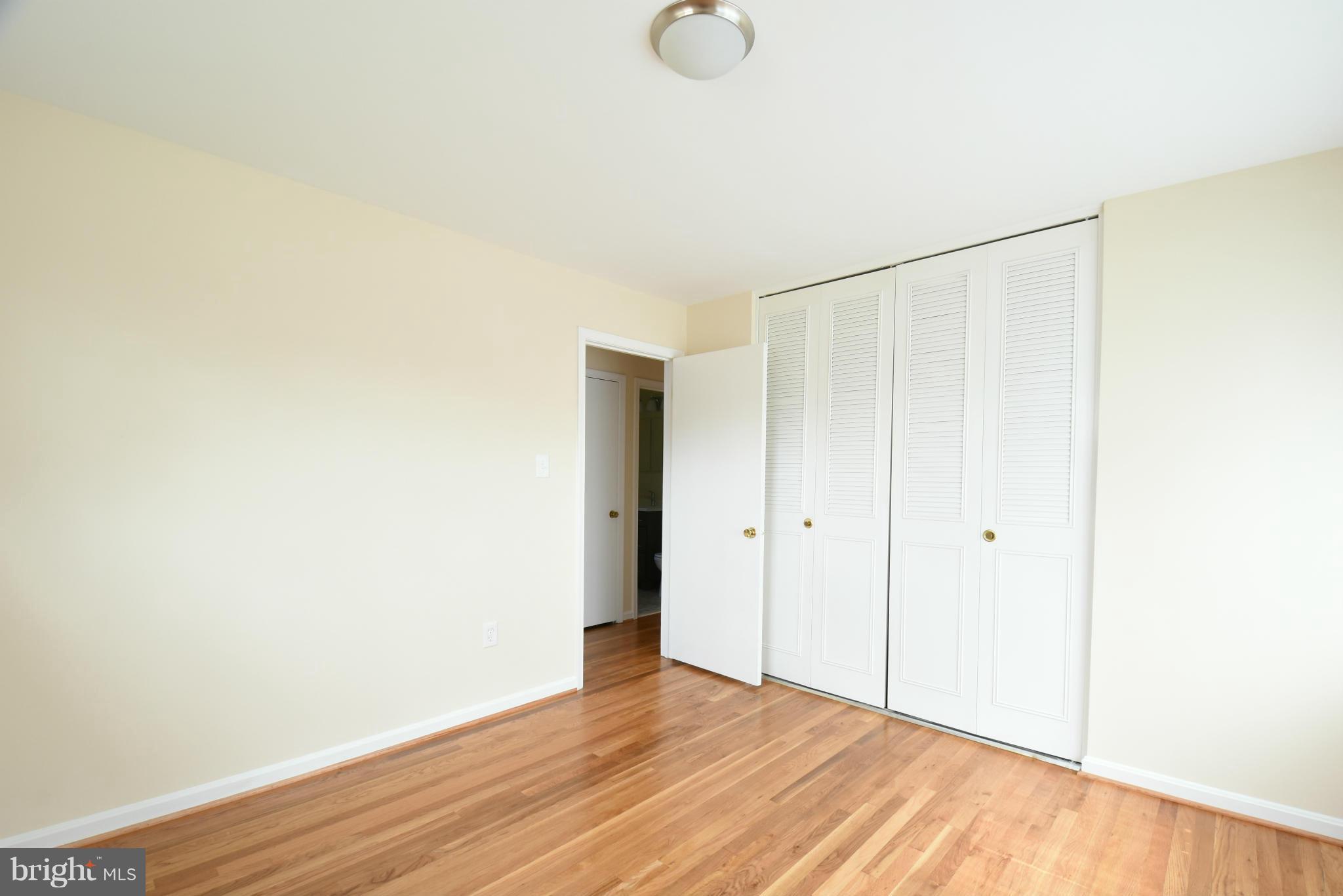5607 Rolling Road Springfield, VA 22151 - Photo 11 of 30 a view of room with wooden floor