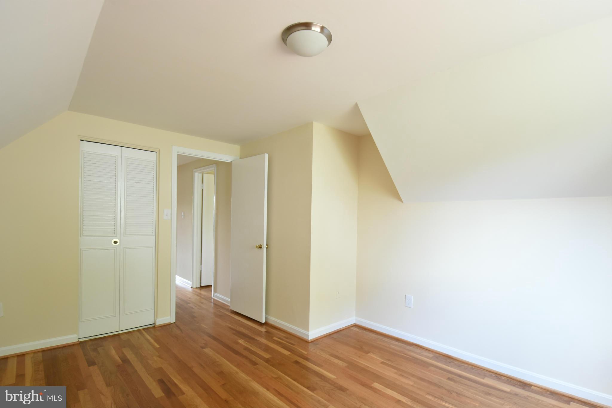 5607 Rolling Road Springfield, VA 22151 - Photo 16 of 30 a view of hallway with wooden floor
