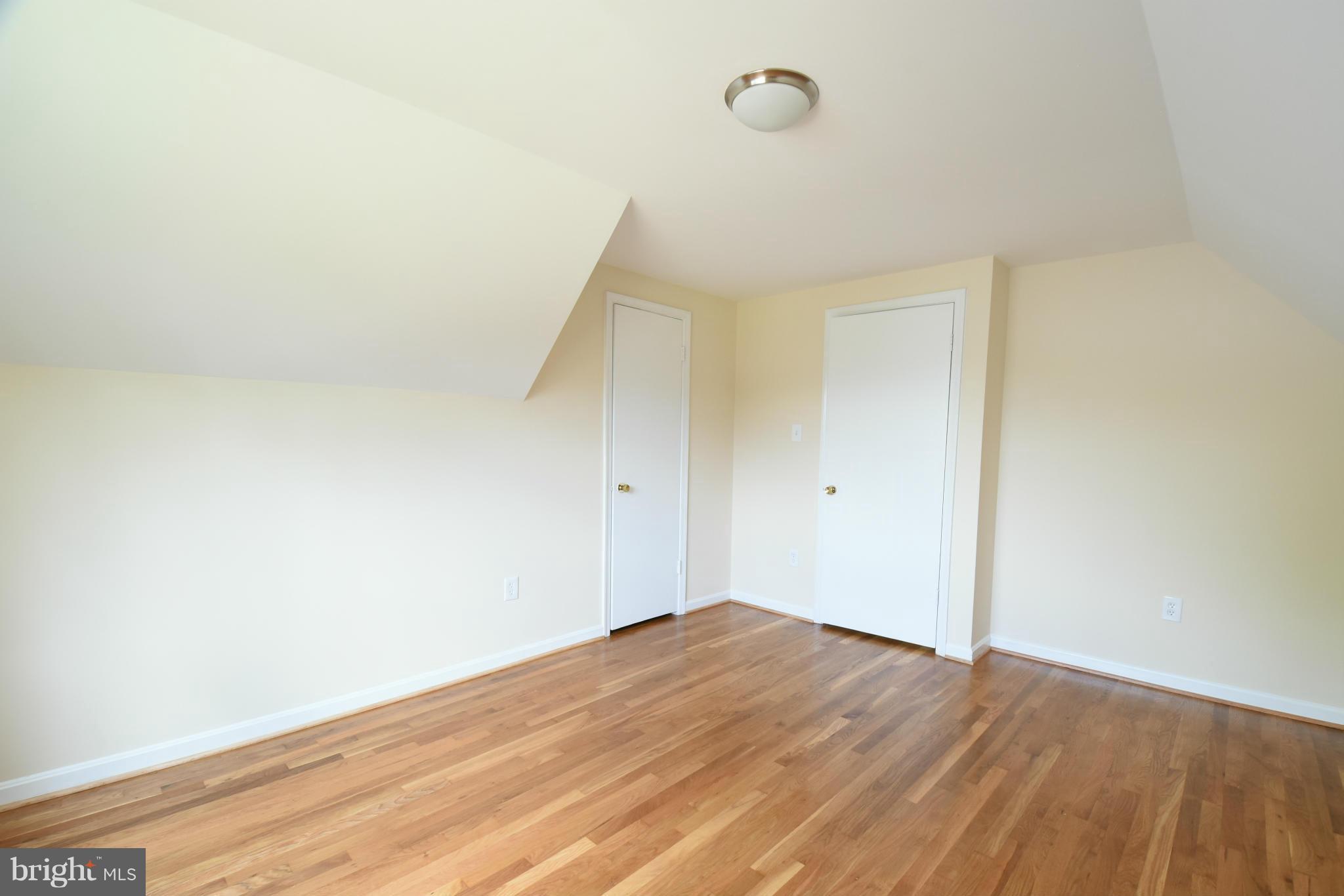 5607 Rolling Road Springfield, VA 22151 - Photo 21 of 30 a view of empty room with wooden floor